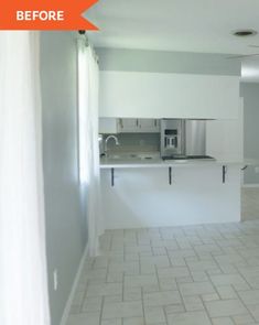 an empty kitchen with tile flooring and white cabinets in the background, before and after remodel