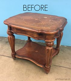 an old coffee table turned into a end table with the words before painted on it