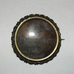 Great Swirling Hair Pin. Victorian, Circa 1880's To 1890's. Measures 1 1/2" In Diameter. Some Blonde And Brown Hair Present. Closes With A C Clasp, Typical Of This Period. Blonde And Brown Hair, Hair Pin, Brown Hair, Hair Pins, Period, Gemstone Rings, Blonde, Women Jewelry, Brass