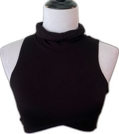 Black Halter Neck Top With Built-in Bra, Cropped Party Vest Top, Black Tank Crop Top With Built-in Bra, Casual Sleeveless Blouse Crop Top For Night Out, Black Stretch High Neck Crop Top, Fitted Sleeveless Black Halter Top, Trendy Sleeveless Stretch Crop Top, Trendy Stretch Sleeveless Crop Top, Trendy Black Sleeveless Tops