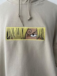 -Double fabric hood -Self-coloured flat draw cord -Single jersey back neck tape -Waist and cuff in cotton/elastane rib Embroidered Anime Hoodie Crewneck, Unisex Anime Hoodie Crewneck, Unisex Manga Hoodie Crewneck, Anime Sweater, Anime Sweatshirt, Anime Shirt, Anime Fan Gift DETAILS: Anime Unisex Embroidered Sweatshirt 50% cotton 50% polyester SIZE: Hoodies are true to size. For detailed sizing information, please check out the sizing chart under the photos to find the right size for you! All swe Embroidered Patch Cotton Sweatshirt For Streetwear, Embroidered Cotton Sweatshirt For Streetwear, Cotton Hoodie With Embroidered Patch For Streetwear, Cotton Hooded Sweatshirt With Embroidered Graphics, Beige Hooded Cotton Sweatshirt, Beige Cotton Sweatshirt With Embroidered Logo, Manga Hoodie, Embroidered Anime, Anime Sweater