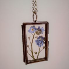 "Real flower Necklace in your chose of Blue Forget Me Not flowers or red Scarlet Gilia flowers that are dried, pressed and preserved between glass in a beautiful antique copper rectangular pendant that is 1.62\" x 1\" and includes an antique brass chain in either a 18\", 20\" or 24\" length for you to choose upon checkout. To preserve the color of the flowers and leaves, please keep out of direct sun. Remove when bathing or swimming. Clean glass with a soft cloth, do not use chemicals. This was Blue Forget Me Not Flowers, Whimsical Ring, Real Flower Necklace, Remembrance Necklaces, Mushroom Ring, Forget Me Not Flowers, Pressed Flower Necklace, Flower Bookmark, Nature Ring