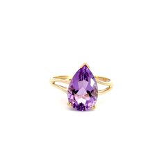 A solitaire ring.  Prong set in the center of the ring is a pear shaped faceted amethyst. The ring has a split style shank. This ring is a size 11.  This ring includes a free sizing up or down 2 sizes.  Once a ring is re-sized, we guarantee the work but we are unable to offer a full refund on the ring. Please contact us for additional sizing options and updated shipping dates if you would like the ring to be sized.   Stone Information Type: Amethyst Measurements: 15.2x10.0mm Metal Content Guaran Classic Teardrop Gemstone Rings, Formal Teardrop Amethyst Ring In Fine Jewelry Style, Elegant Teardrop Amethyst Ring, Formal Pear-shaped Amethyst Ring With Prong Setting, Elegant Teardrop Amethyst Gemstone Ring, Elegant Teardrop Purple Amethyst Ring, Purple Teardrop Amethyst Ring For Anniversary, Elegant Purple Teardrop Amethyst Ring, Classic Pear-shaped Purple Jewelry