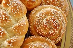 sesame seed bread rolls on a plate ready to be eaten for lunch or dinner party