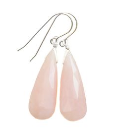 Soft Pink Peruvian Opal earrings. Faceted cut teardrop. High quality French ear wires - either 14k solid yellow gold or 14k gold filled or sterling silver available - you choose. Gemstone size is 10x28mm, 18 carats. The mannequin shows the relative size and how they will hang. Earrings hang 1.8 inches. Opals are naturally lightweight to wear for larger earrings. Please check out my store for more gemstone earrings, bracelets and necklaces. Hang Earrings, Peruvian Opal, Opal Earrings, Large Earrings, Pink Opal, Solid Yellow, Ear Wires, Gemstone Earrings, Soft Pink