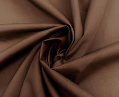 a close up view of a brown fabric