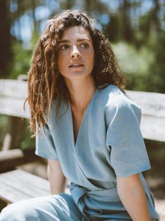 "AURORA is a short sleeve jumpsuit with belt. DETAILS - Wrap style top - Dolman sleeves - Self tie belt - 100% lightweight European linen fabric - Cut and sewn to order just for you in our studio COLOR - Dark Turquoise, you can also choose other colors above - Fabric samples are available here https://www.etsy.com/listing/586569696/linen-fabric-samples SIZING & FIT - Fits true to size - Inseam is approximately 28.5 inches / 72 cm - Bust is approximately 21 inches / 49.5 cm - Waist is approxi Chic Belted Short Sleeve Jumpsuits And Rompers, Chic Belted Jumpsuits And Rompers With Short Sleeves, Summer Workwear Jumpsuits With Short Sleeves, Chic Belted Jumpsuit With Short Sleeves, Chic Belted Short Sleeve Jumpsuit, Summer Workwear Jumpsuits And Rompers With Belted Cuffs, Blue Belted Jumpsuit For Summer, Casual Short Sleeve Belted Dress For Summer, Fitted Short Sleeve Jumpsuits And Rompers With Tie Waist