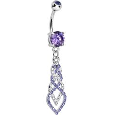 a purple and white belly ring with an intricate design on the end, hanging from a chain