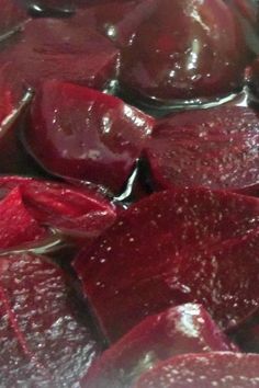 sliced beets are being prepared to be cooked in the oven with oil on them