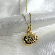 14K Gold Sun & Moon Charm Pendant With 0.9MM Singapore Chain Necklace Real Gold  Necklace Charm Celestial Solid Gold Necklace ✅ PENDANT SPECIFICATIONS:  * Height: 0.51 in. (13 MM) * Width: 0.59 in. (15 MM) * Average Weight: 1.32 gr. ✅ CHAIN SPECIFICATIONS:  * Clasp: Spring-Ring  * Width: 0.9 MM ➤ Length: 16 inches   Avg Weight: 0.64 ➤ Length: 18 inches   Avg Weight: 0.71 ➤ Length: 20 inches   Avg Weight: 0.76 ➤ Length: 22 inches   Avg Weight: 0.83 ✅SHIPPING CONTENTS: -14K Gold Pendant & Chain -J Silver Sun And Moon Design Gold-plated Necklace, 14k Gold Celestial Moon Charm Necklace, 14k Gold Celestial Moon Phase Necklace, Celestial Yellow Gold Charm Necklaces With Moon Phase, Celestial Yellow Gold Moon Phase Charm Necklaces, 14k Gold Pendant Necklaces With Sun And Moon Design, Celestial Gold Plated Jewelry With Coin Pendant, 14k Gold Sun And Moon Pendant Necklace, Celestial Style Gold Plated Coin Pendant Jewelry