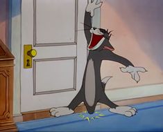 a cartoon cat with its mouth open standing in front of a door