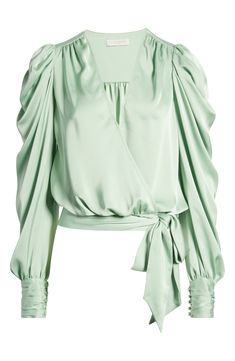 A serene shade and a lustrous fabric softly animate this graceful blouse styled with the season's abundant sleeves. 20" length (size medium) 100% polyester Dry clean Imported Green Silk V-neck Top, Chic Fitted Blouse With Draped Sleeves, Fitted Silk Tops With Gathered Sleeves, Summer Formal Tops With Pleated Sleeves, Fitted Silk Blouse With Draped Sleeves, Spring Evening Blouse With Lantern Sleeves, Fitted Tops With Draped Sleeves For Spring, Evening Blouse With Draped Sleeves For Fall, Spring Evening Tops With Pleated Sleeves