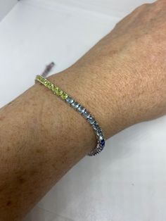 Vintage Cubic Zirconia Bracelet Clear rainbow Crystal Tennis 7.5 inches All jewelry is shipped free in the US in a nice gift box. Check out our over a THOUSAND great reviews Engraving is $4 per letter and is not always perfect depending on the piece. It can take a few days if the jeweler is busy. This is payable to Paypal Judithsltd@gmail.com Luxury Multicolor Tennis Bracelet As Gift, Elegant Multicolor Tennis Bracelet As A Gift, Sterling Silver Tennis Bracelet With Sparkling Stones As Gift, Multicolor Cubic Zirconia Tennis Bracelet Gift, Elegant Multicolor Diamond Bracelet As Gift, Multicolor Cubic Zirconia Tennis Bracelet For Anniversary, Multicolor Bracelets With Sparkling Stones For Gift, Adjustable Multicolor Tennis Bracelet Gift, Adjustable Multicolor Tennis Bracelet As Gift