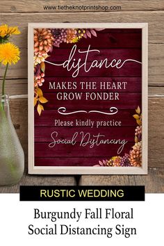 a wooden sign with flowers on it and the words rustic wedding written in cursive font