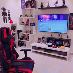 a gaming chair in front of a flat screen tv