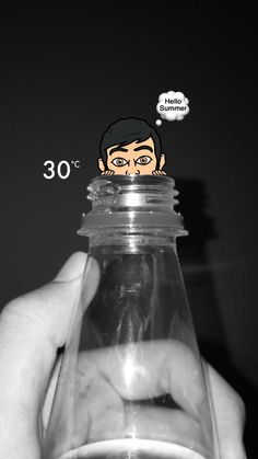 a hand holding a glass jar filled with liquid and an image of a man's face