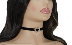 Soft to touch and pretty looking white velvet choker collar with a rhinestone silver plated or gold plated heart pendant charm. Choker necklace length is 33cm = 13 inch with adjustable 6 cm = 2 3/8inches chain. Velvet 10mm = 0.39 inches wide. Rhinestone heart about 2.6x2.4cm = 1.02x0.94 inches. Please, contact me if you need different length of the necklace. More chokers you can find here https://www.etsy.com/shop/lorArtstudio/edit?ref=seller-platform-mcnav&section_id=22503134 Thank you for stopping by my shop! I hope you have found something that you love!   Add my shop to your favorites and you'll get notifications about new jewelry and promotions Velvet Necklace, Charm Choker Necklace, Gold Heart Pendant, Black Velvet Choker, Necklace Collar, Heart Pendant Gold, Velvet Choker, White Velvet, Valentines Day Gifts For Her