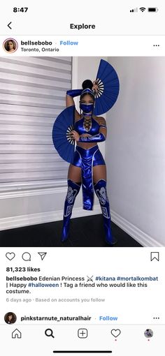 an instagramted photo of a woman dressed in blue with parasols on her head