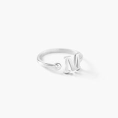 Tiny Initial Ring, Silver | Oak & Luna Everyday Engraved Initials Open Ring, Everyday Open Ring With Initials, Adjustable Initials Stackable Rings For Everyday, Minimalist Engraved Open Ring With Initials, Everyday Adjustable Stackable Rings With Initials, Everyday Initial Open Ring, Everyday Open Initial Ring, Sterling Silver Initial Ring For Everyday, Adjustable Monogram Initial Ring For Everyday