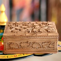 a wooden box sitting on top of a table