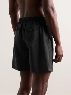 Noah's high-performance swim shorts are streamlined and versatile, making them equally as suitable for warm-weather hikes and runs. Cut from lightweight, quick-drying nylon, they have internal mesh briefs and a drawstring waistband. Sporty Nylon Swim Trunks With Relaxed Fit, Relaxed Fit Moisture-wicking Travel Bottoms, Moisture-wicking Relaxed Fit Travel Bottoms, Moisture-wicking Relaxed Fit Bottoms For Travel, Relaxed Fit Nylon Swim Trunks For Outdoor Activities, Nylon Swim Shorts With Functional Drawstring, Summer Athletic Shorts With Functional Pockets For Outdoor Activities, Summer Nylon Bottoms With Functional Pockets, Nylon Swimming Shorts With Functional Drawstring