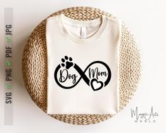 a t - shirt that says dog mom with a heart and paw on the front