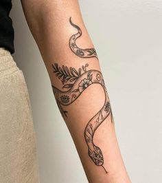 a person with a tattoo on their arm