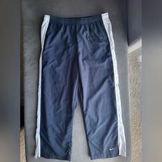 Womens Nike Sweatpants Capri Length Navy Blue With White Has Pockets New With Tags Smoke And Pet Free Home Casual Blue Capris For Sports, Maroon Nike, Sportswear Trends, Black Jogger Pants, Adidas Track Suit, Nike Joggers, Cropped Joggers, Nike Sweatpants, Black Sweatpants