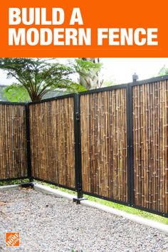 a fence made out of bamboo sticks with the words build a modern fence