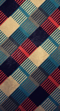 an abstract plaid pattern with red, blue and black squares on it's surface