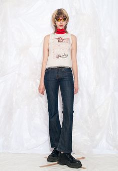 These Y2K vintage flare jeans by Crocker are giving us major Britney Spears vibes. Slip into these flares and feel like you can conquer the world. Features: - five pockets - zip closure - 98% cotton, 2% elastane Every item we manage is cleaned and, when necessary, repaired, ensuring it arrives to you in top condition. Our model, Szonja is 173 cm / 67.5" tall and she's a size XS. Size: XS / US 2 / UK 6 / IT 38 Other size info: Labelled size: W26L32 Measurements:  waist (seam to seam): 36 cm / 14. 2000s Low Rise, Slip Top, Grunge Streetwear, Vintage Flare, Natural Fabric, Style Expert, Lace Bodysuit, Britney Spears, Y2k Vintage