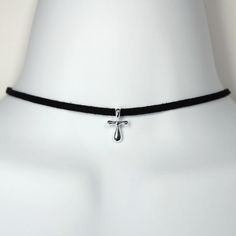 This choker features a silver tone plain cross measuring just a bit over half an inch tall). The suede is made in Greece, and is adjustable from 12.5" to 14.5" in length. Adjustable Cross Choker For Gifts, Adjustable Silver Cross Choker, Cross Pendent, Silver Shark, Cross Choker, Shark Tooth Necklace, Tooth Necklace, Floral Cross, Sterling Silver Chain Necklace