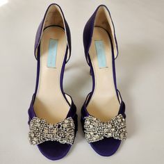 Nwot Betsy Johnson Satin Peep Toe Embellished Heels In Purle ||| Clustered Rhinestone Embellished Front Bow ||| Peep Toe ||| D'orsay Cutout ||| Purple Crystal Embellished Heels For Evening, Purple Crystal Embellished Evening Heels, Embellished Open Toe Heels, Purple Embellished Open Toe Heels, Embellished Purple Heels For Evening, Embellished Purple High Heels, Chic Embellished Purple Heels, Purple Embellished High Heels, Chic Purple Embellished Heels