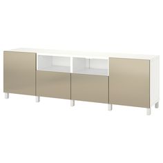 the sideboard has three doors and two shelves