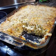 a casserole dish sitting on top of a stove