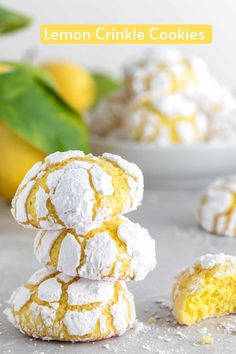 lemon crinkle cookies stacked on top of each other with powdered sugar around them