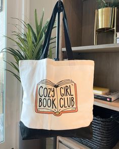 This 100% cotton canvas tote is super sturdy and perfect for light grocery shopping, a day at the beach, a trip to the book store, and more!   DIMENSIONS: ✷15"w x 4.75"d x 18.5"h (excluding straps.  straps measure 13")   CARE INSTRUCTIONS: ✷Do not iron over design ✷Machine washing not recommended Bookish Cotton Tote Bag, Cotton Tote Bag With Bookish Style, Canvas Tote Bag For Study, Book Theme, Bookish Merch, Etsy Prints, Business Events, Book Themes, Book Store