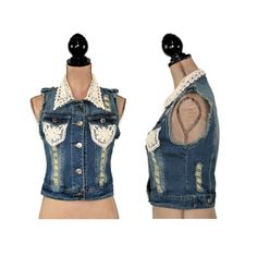 "This new \"destroyed\" denim vest is 100% cotton and has been embellished with romantic lace and pearl beads. This romantic boho piece can be styled in so many ways. Each piece in our HEART ALTERED collection has been embellished with our signature ♥ charm. 100% cotton Hand wash, hang dry. Measurements: Label marked small ~ FITS LIKE XXS Bust ~ 33 inches Waist ~ 30-1/2 inches Length from top of shoulder to bottom of the vest ~ 19 inches Label marked medium ~ FITS LIKE XS Bust ~ 34 inches Waist Stretch Cotton Denim Vest For Summer, Summer Stretch Cotton Denim Vest, Spring Stretch Cotton Denim Vest, Sleeveless Denim Vest For Festivals, Stretch Cotton Sleeveless Denim Vest, Summer Distressed Cotton Denim Vest, Trendy Fitted Denim Vest For Festivals, Bohemian Sleeveless Denim Vest, Distressed Cotton Sleeveless Denim Vest