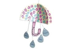 a paper umbrella with rain drops hanging from it's side and the words, i love you