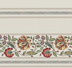 a white and red flowered border with dots on the bottom right hand side,