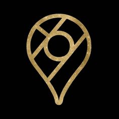 a gold logo with the letter g in it's center on a black background