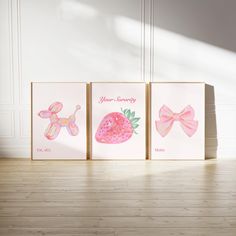 three cards with pink bows and strawberries on them are displayed in front of a white wall