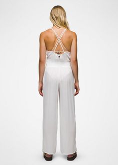 An effortless wide-leg jumpsuit made for pulling on over your swimsuit. Summer Loungewear Jumpsuits And Rompers Overall, Chic White Strapless Jumpsuit For Summer, Chic White Strapless Jumpsuit For The Beach, Elegant Strapless Jumpsuit For Beach, Elegant Strapless One-piece Jumpsuit For Summer, Summer Wide-leg Jumpsuits For Vacation, Stretch Wide Leg Jumpsuits For Loungewear, Summer Wide-leg Jumpsuits And Rompers For Vacation, Summer Stretch Jumpsuits And Rompers For Loungewear