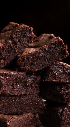 chocolate brownies stacked on top of each other