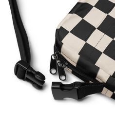 It's a Retro Revival! This bag is sturdy, stylish, and ready to go wherever you do. With adjustable straps and two spacious pockets, it’s the ultimate accessory for hiking, festivals, and everyday use. Featuring an all-over print of a retro black and cream checkerboard pattern, this crossbody bag adds a bold and timeless twist to any outfit. Perfect for a 90s-inspired back-to-school look, it's both functional and fashionable. Key Features: 100% polyester Fabric weight: 9.91 oz./yd.² (336 g/m²) B Retro Black Backpack Shoulder Bag, Black Bags With Adjustable Straps For Outdoor Activities, Black Shoulder Bag With Adjustable Straps For Outdoor, Casual Camping Bags With Adjustable Strap, Casual Camping Bag With Adjustable Strap, Retro Rectangular Bags For Outdoor Activities, Black Backpack For Camping, Retro Outdoor Bags With Adjustable Strap, Retro Bags With Adjustable Strap