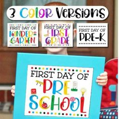 a young boy holding up a sign that says first day of school