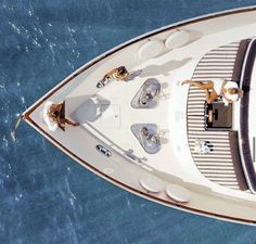 an aerial view of a boat in the water