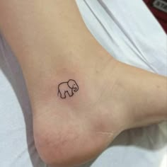 small elephant tattoo on the ankle