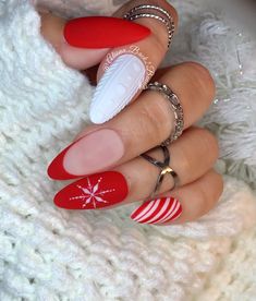 "Elegant Christmas Press on Nails Model: Medium almond Please read full description below. This set features: Handpainted snowflakeon the ring finger with matte finish Handpainted peppermint design on pinky finger with matte finish Textured sweater design on index finger I offer quality handcrafted press on nails designed with quality gel polish. This set will give you a perfect manicure within a few minutes for a small portion of the salon cost. Sets come with 10 nails (based on the size/shape Christmas Nail Art Easy, Unghie Sfumate, Red Christmas Nails, Christmas Nails Easy, Stiletto Nails Designs, Christmas Nail Art Designs, Red Nail Designs, Christmas Nails Acrylic, Super Nails