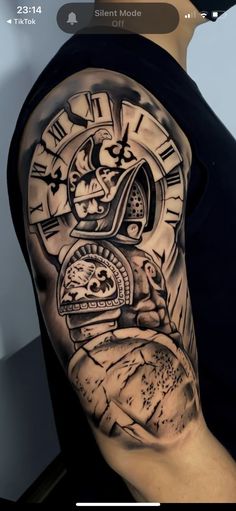 a man with a clock tattoo on his arm